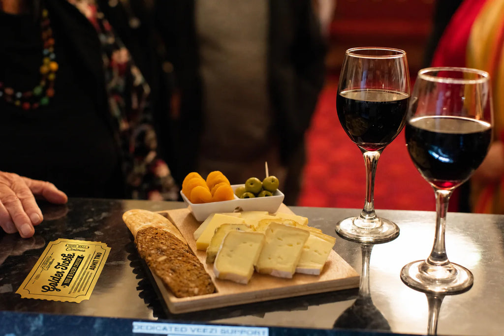 Town Hall Golden Ticket with two glasses of wine and a cheeseboard for two